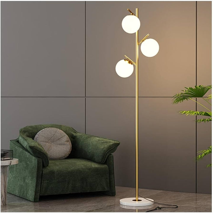 Modern Brass Floor Lamp with Triple Globe Lights